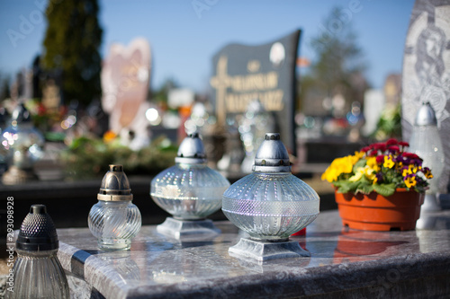 Obraz na płótnie All Souls' Day - cemetery, memory of the dead, prayer and candles w salonie