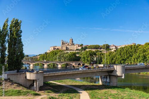 The bridges and Cathedral Saint-Nazaire in the Beziers town. Cathedral is the largest Gothic monument in the city. Built in the XIV century, It's a symbol of the city. France