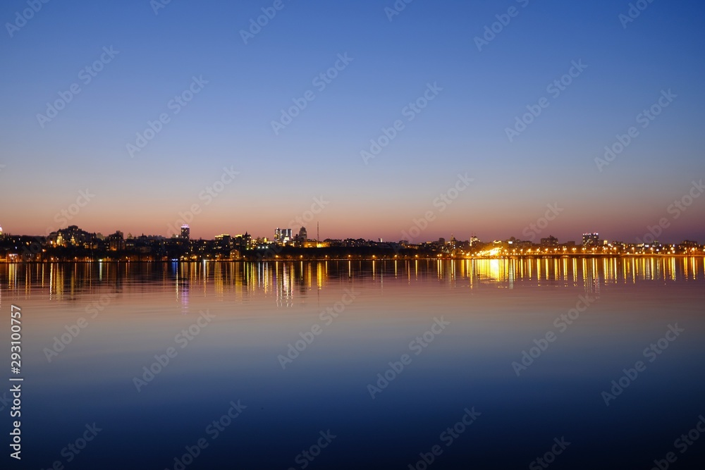 city on water background in the evening