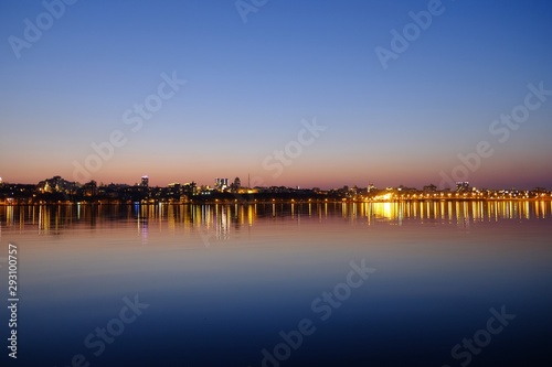 city on water background in the evening