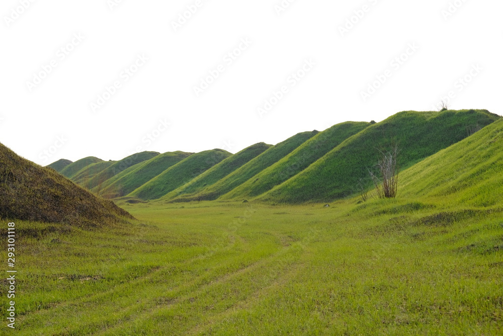 earthen hills covered with green grass