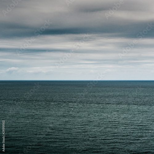 ocean and sky landscape with expressive clouds