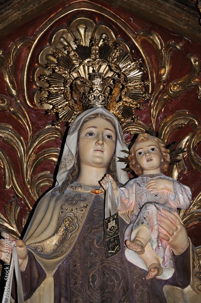 Statue of Madonna and baby Jesus inside Santa Maria church, Albox, Spain.