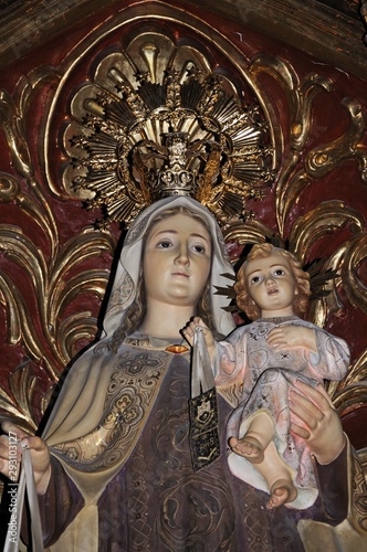 Statue of Madonna and baby Jesus inside Santa Maria church, Albox, Spain.
