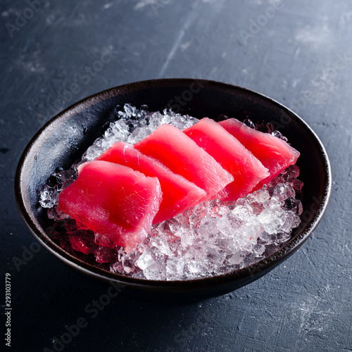 Japanese foods sashimi, Fresh raw sliced fish on black plate, Traditional Japanese food menu