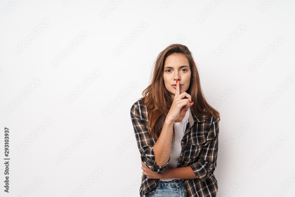 Close up of a young beautiful girl wearing plaid shirt Close up of a young beautiful girl wearing plaid shirt