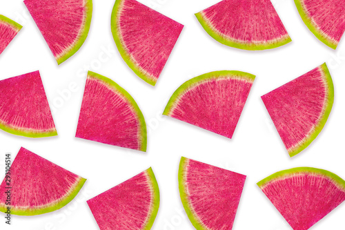 Isolated watermelon radish slices. Colorful pink pieces on white background.