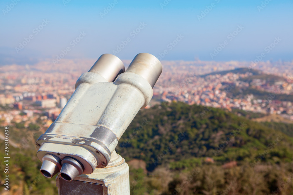   viewing platform to the city with binocular