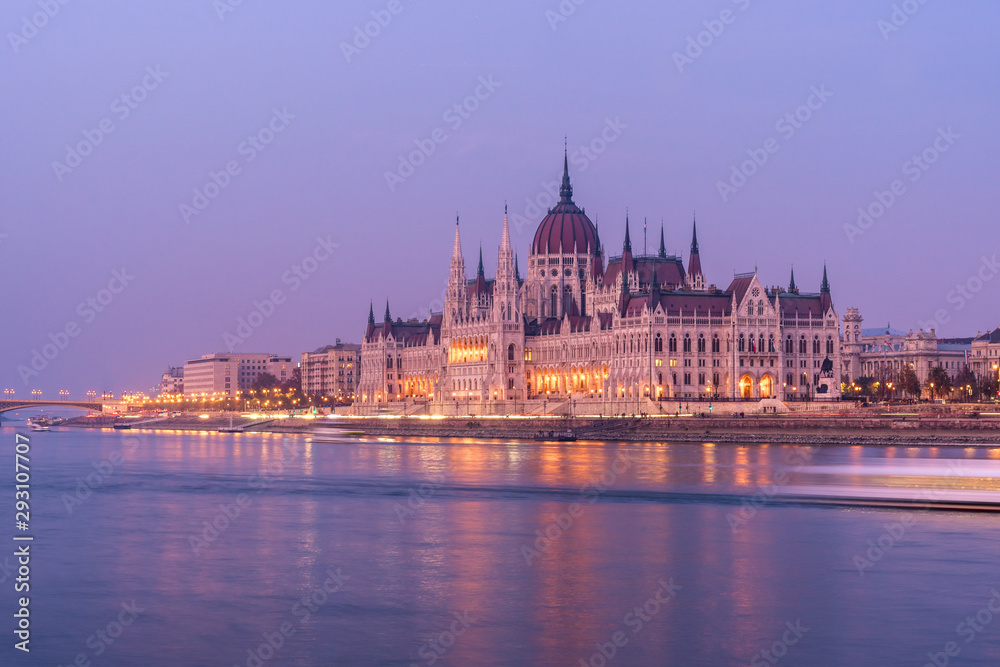 Hungarian Parliament building and Danube River in the Budapest city in the evening. A sample of neo-gothic architecture.
