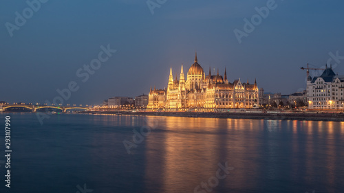 Incredible Evening View of Budapest parliament and Danube river at sunset  Hungary. Wonderful Cityscape with Colorful sky.