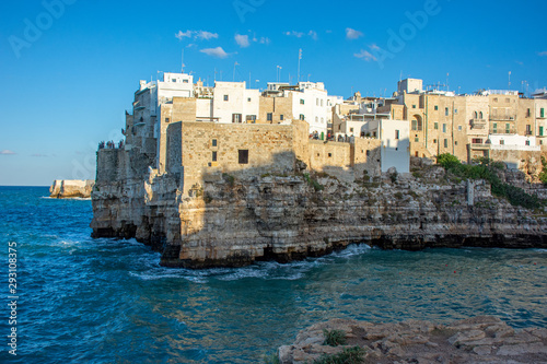 Italy, Polignano a mare, view of the houses overlooking the sea