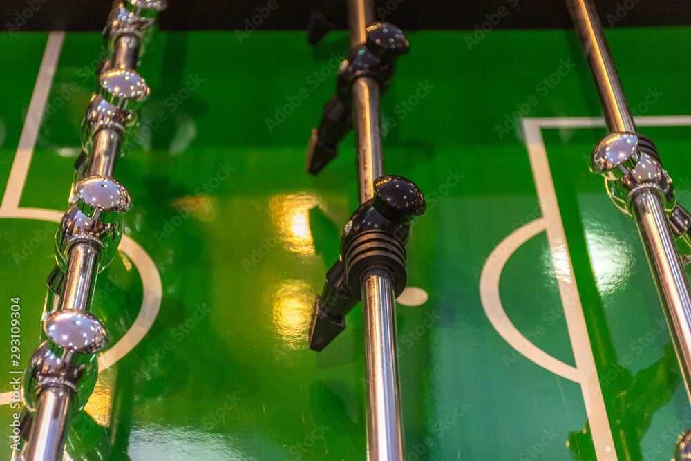 Closeup of a football with a green background