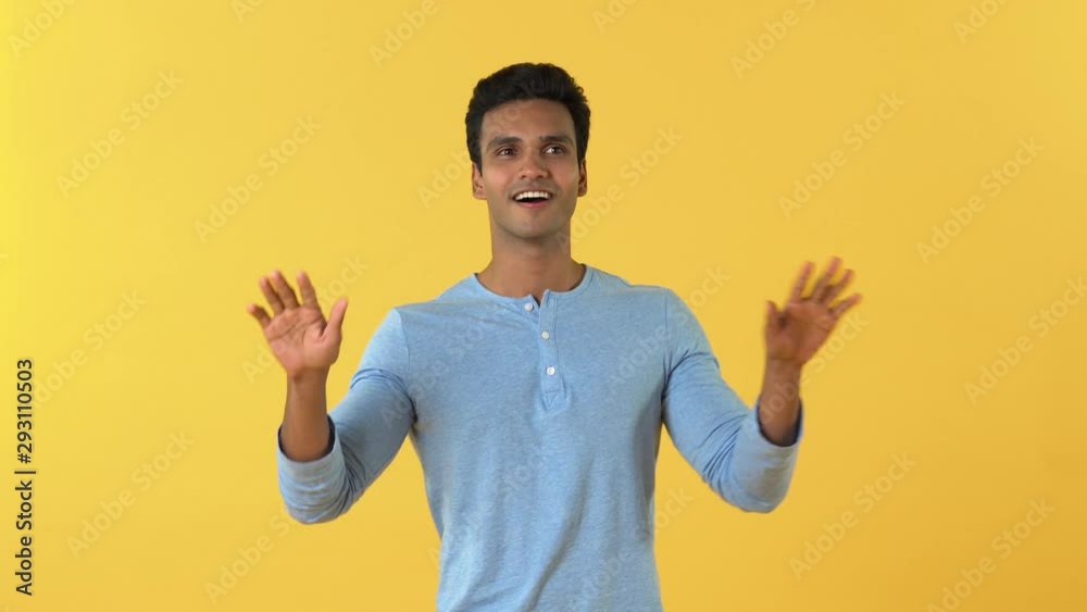 Half body portrait of happy Indian man dancing Half body portrait of happy Indian man dancing