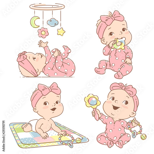 Set with baby girl playing toys. First year games.
