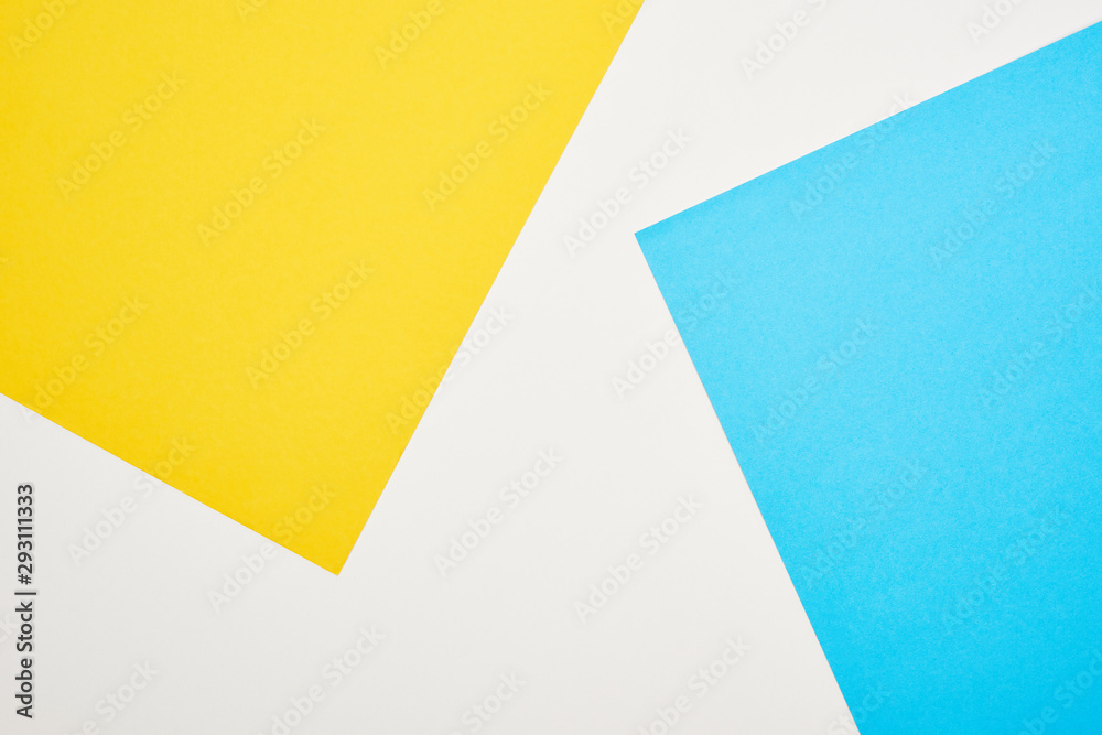 top view of geometric blue, yellow and white background top view of geometric blue, yellow and white background