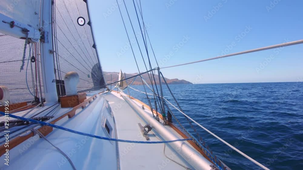 Sailboat Crosses In Front of Another Sailboat in Catalina Sailboat Crosses In Front of Another Sailboat in Catalina