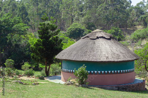 Round hut with grass roof, rondaval, south african zulu hut