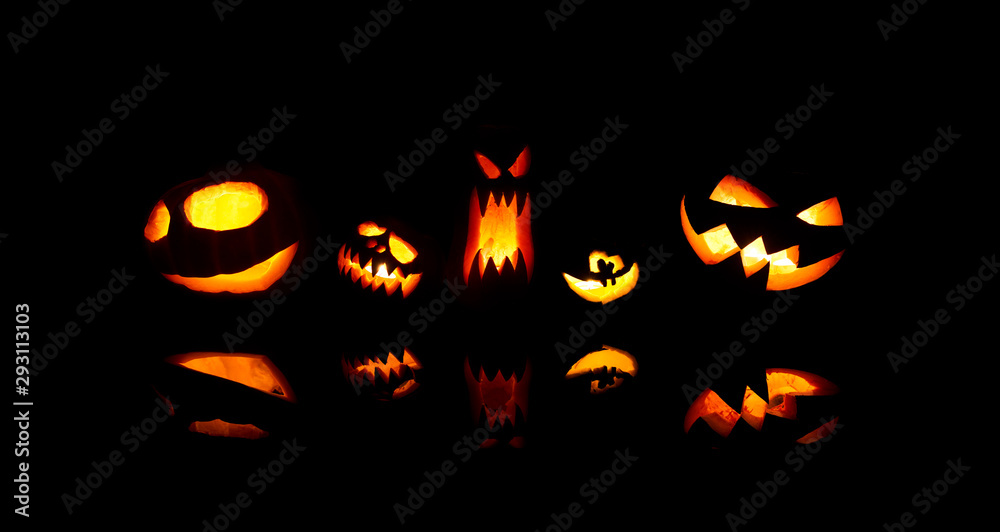 Image of halloween pumpkins with burning mouths on blank black background. Image of halloween pumpkins with burning mouths on blank black background.