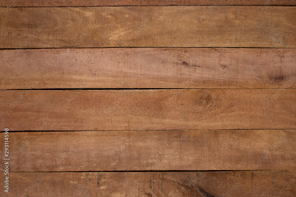 Simple wooden texture background made from several lengths of rough finishde hardwood timber - background and textures design element. Simple wooden texture background made from several lengths of rough finishde hardwood timber - background and textures design element.
