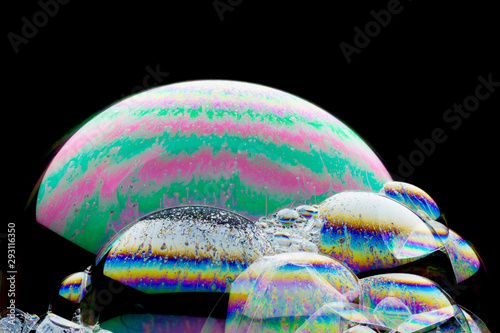 Colorful fantasy spheres - beautiful  soap-bubble abstract on black background