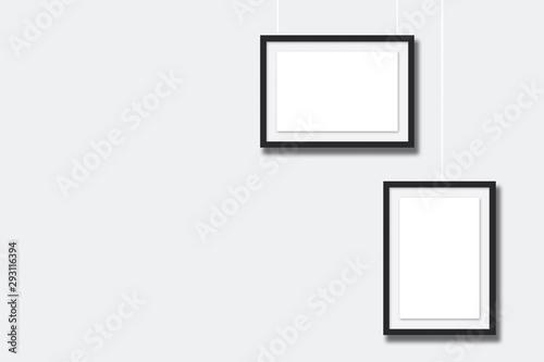 blank photo frames on the wall