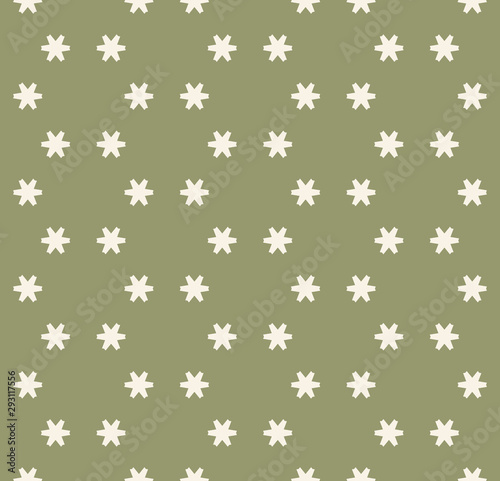 Green vector seamless pattern with small geometric flowers, snowflakes, stars