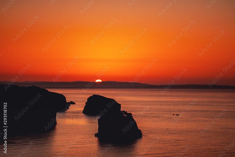 Sunset view of the famous coastline. Best port of vacation to watch the ocean on a warm summer day. Praia da Marinha, Famous Beach, Algarve Coast, Lagoa, Portimao in South Portugal, Atlantic Ocean