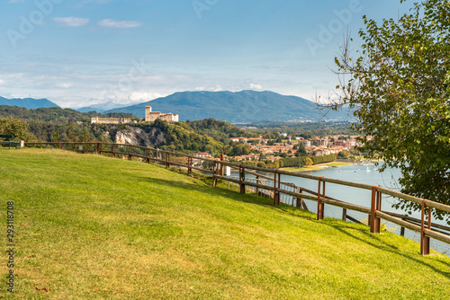 View of Borromeo Castle at Angera from the public park of Rocca Borromeo of Arona, Italy