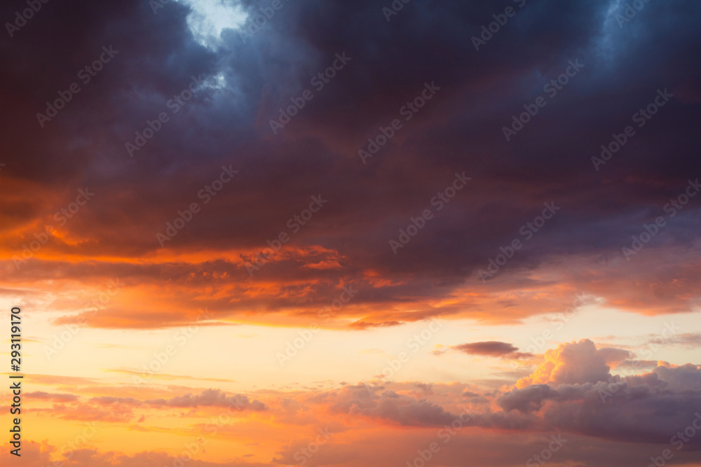 Storm clouds at sunset in bright colors