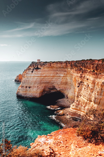 Beautiful coastline with ocean view and rock islands and beaches on a bright sunny summer vacation day. Lagos, Faro, Portimão, Algarve coast in Portugal, Atlantic Ocean