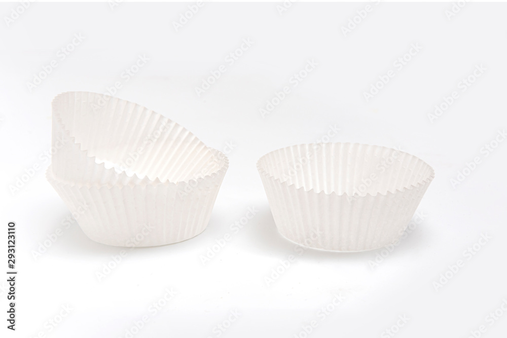White cupcake paper cups on white background White cupcake paper cups on white background