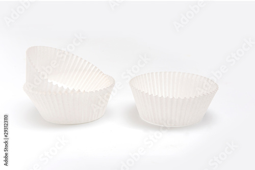 White cupcake paper cups on white background