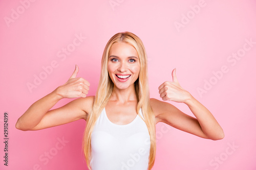Great job. Photo of pretty lady raising thumbs up expressing positive attitude wear casual outfit isolated pink color background