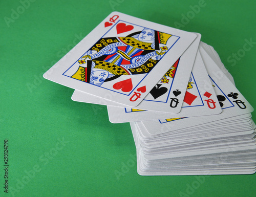 playing cards on green background