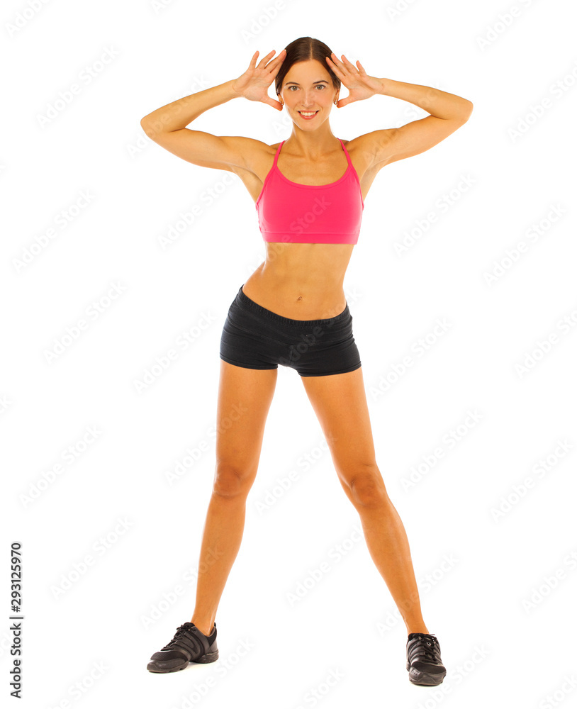 Young fitness brunette woman in red top and black shorts Young fitness brunette woman in red top and black shorts