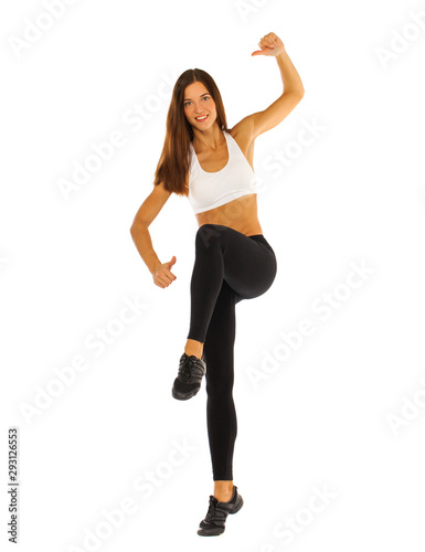 Young healthy girl doing exercises, full length portrait isolated over white background