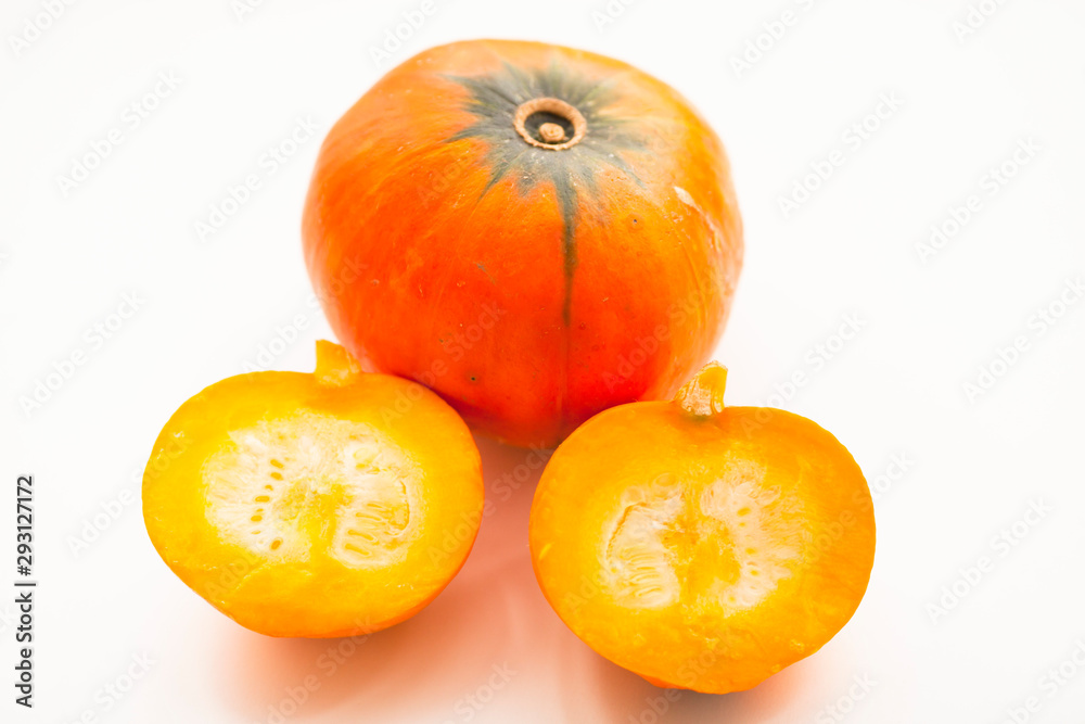 Fresh sliced pumpkin(squash), apples, glass jar of honey isolated on white background. Food, Thanksgiving day concept. Top view. Space for a text. Flat lay. Close up. Fresh sliced pumpkin(squash), apples, glass jar of honey isolated on white background. Food, Thanksgiving day concept. Top view. Space for a text. Flat lay. Close up.