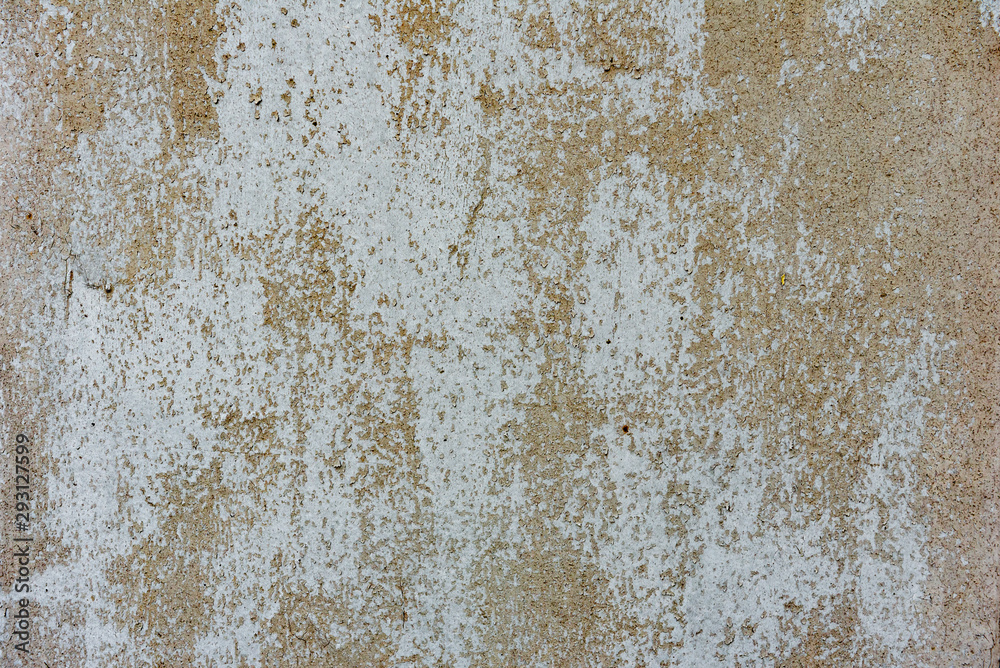 Texture of a concrete wall with cracks and scratches which can be used as a background Texture of a concrete wall with cracks and scratches which can be used as a background