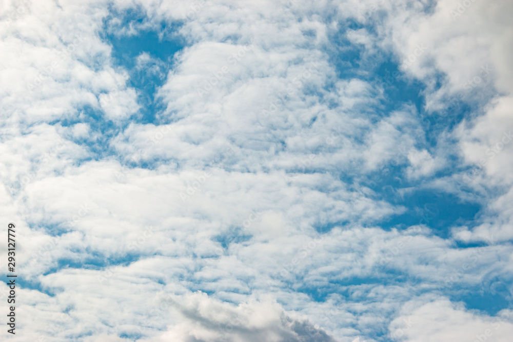 white clouds in the blue sky white clouds in the blue sky