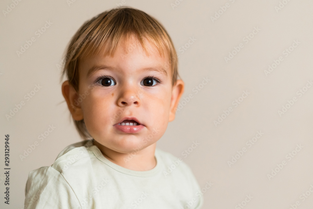 Portrait of cute baby boy isolated on the white background. Copy space. One year old Portrait of cute baby boy isolated on the white background. Copy space. One year old