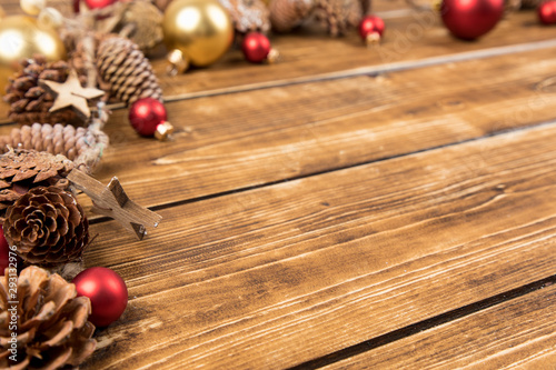 chirstmas frame with balls and pine cones