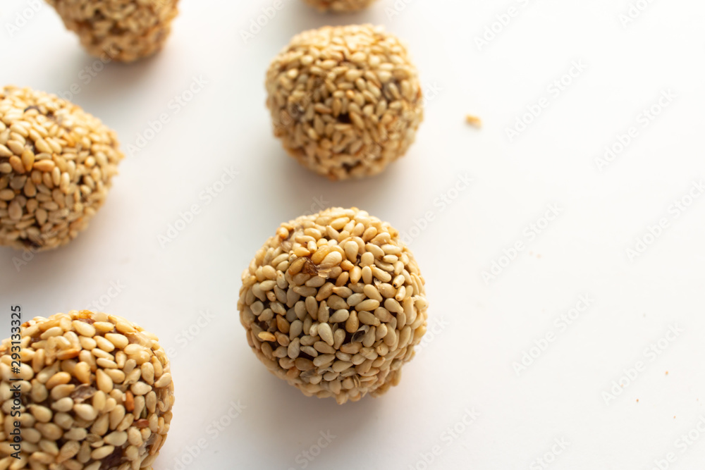Healthy homemade cookie with nuts and sesame on white background Healthy homemade cookie with nuts and sesame on white background