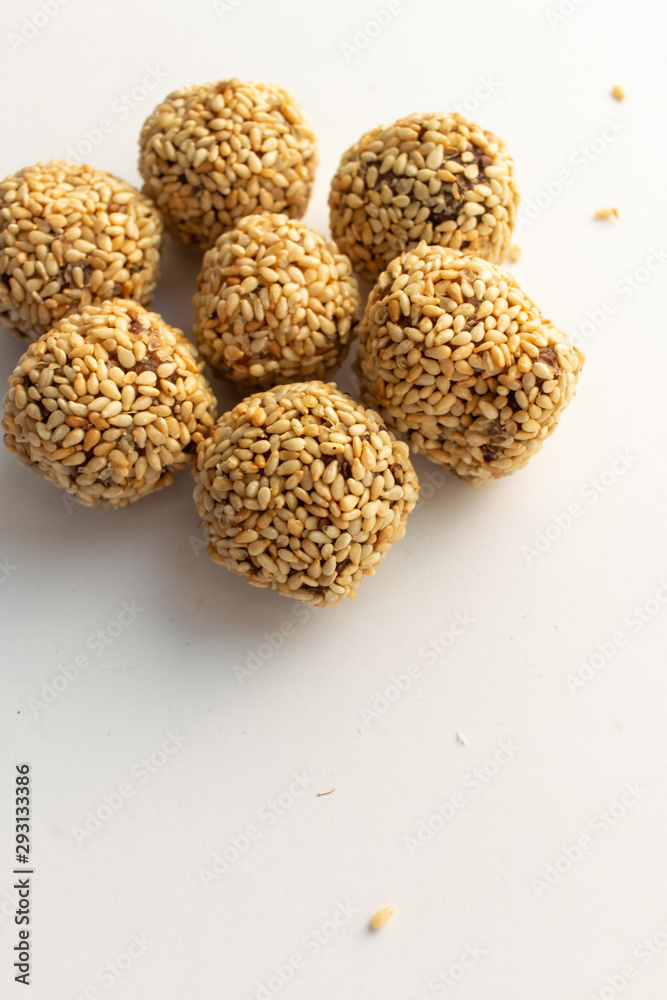 Healthy homemade cookie with nuts and sesame on white background Healthy homemade cookie with nuts and sesame on white background