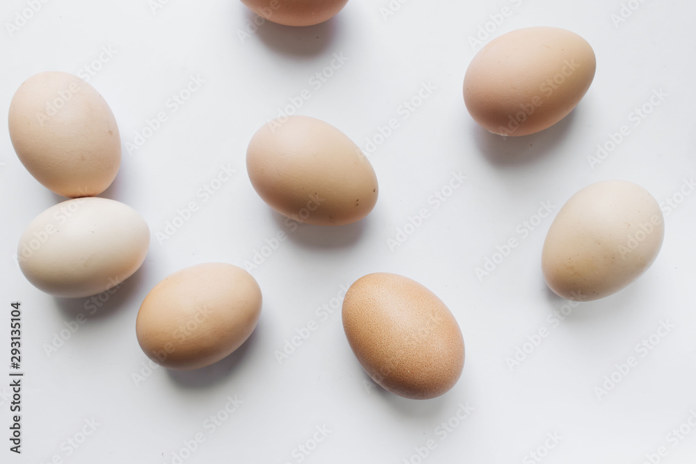 Chicken eggs in cardboard package on white background Chicken eggs in cardboard package on white background