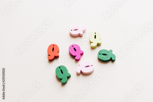 Colorful small wooden Q letters