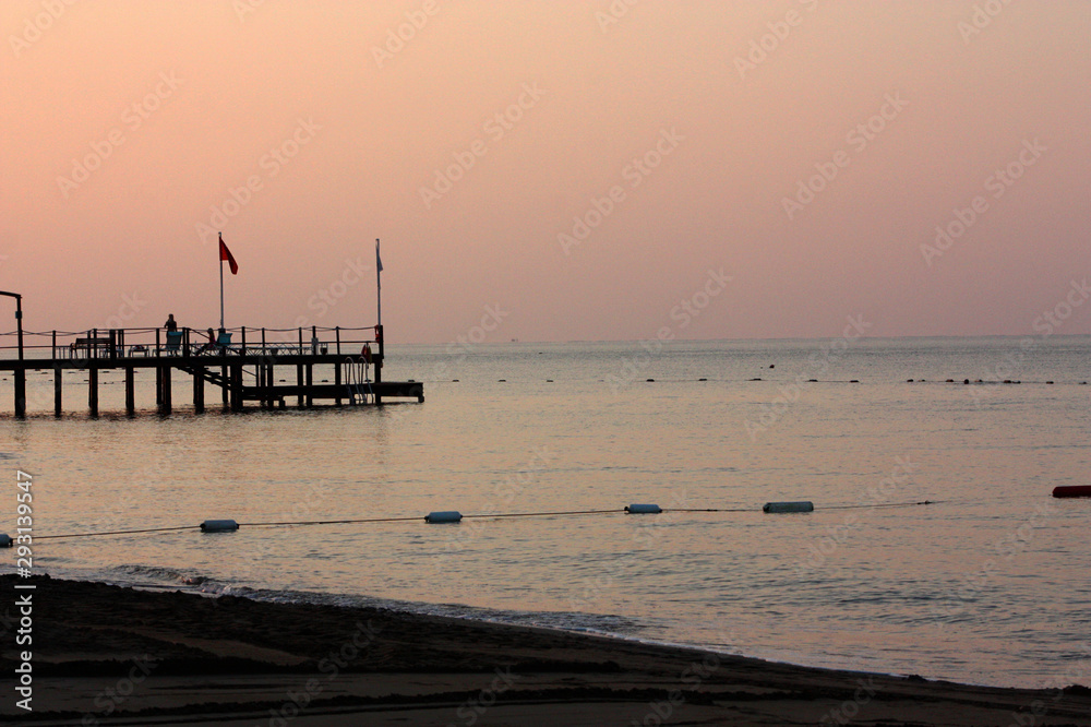 Romanticly view of the sea, sunset, fishing boats, Turkey.
