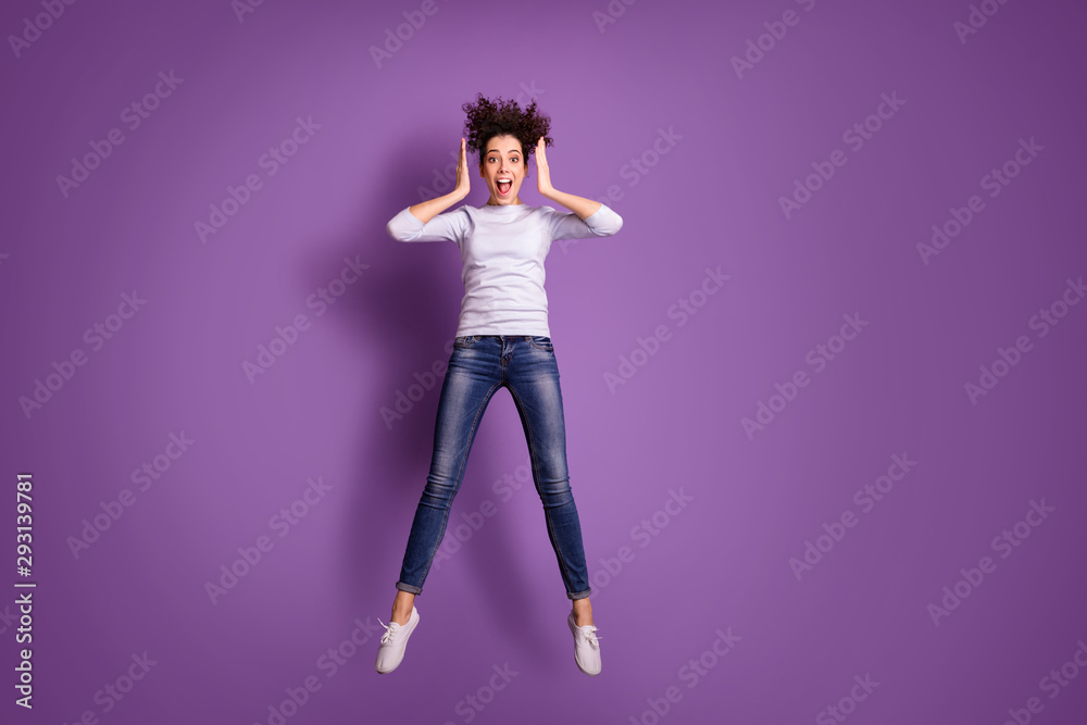Full length body size photo of white cute nice charming fascinating youngster learning sales beginning jumping jeans denim screaming isolated over purple pastel color background