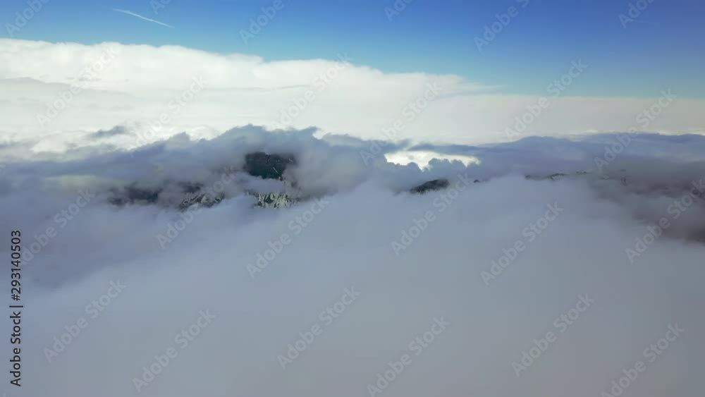 Aerial Forward: Amazing Snowy Mountains in Thick Clouds - Le Brevent, France Aerial Forward: Amazing Snowy Mountains in Thick Clouds - Le Brevent, France