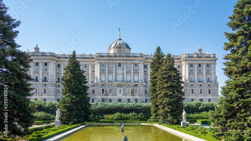 Public garden and the Royal Palace in Madrid in a beautiful summer day, Spain