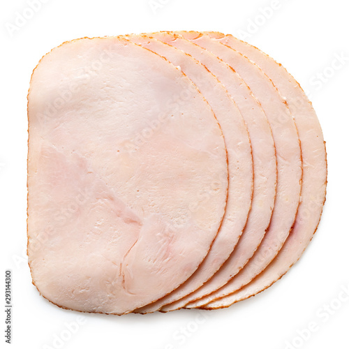 Fotografía A stack of five slices of chicken ham isolated on white